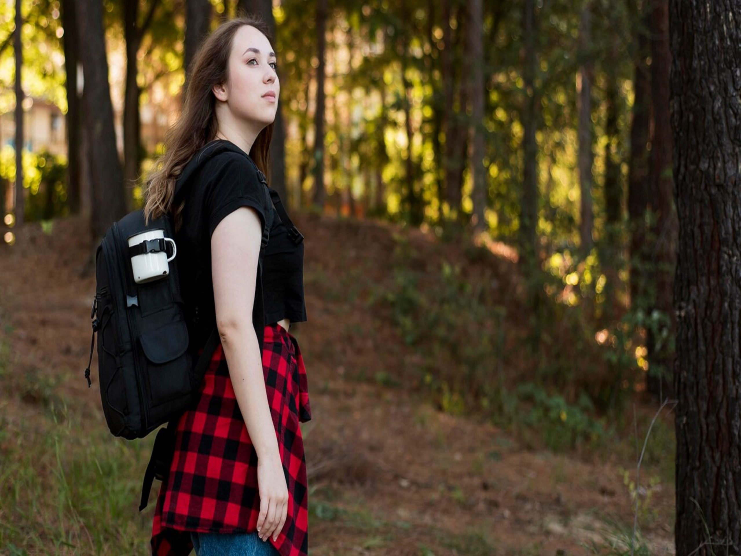 mid-shot-brown-haired-girl-forest_23-2148637069